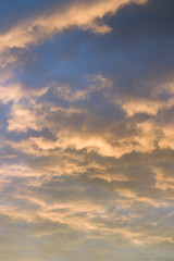 Naklejka na ściany i meble Dramatic cloud on evening sky. Sunset over horizon.