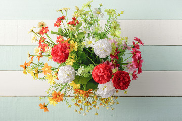 Flower bouquet on wooden table