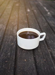 Cup of coffee put on wood table