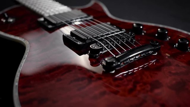 red electro guitar play rock music instrument