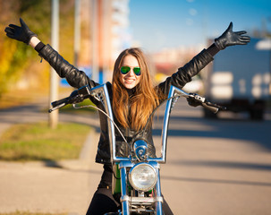 Obraz premium Tanya. motorcycle, black jacket, half height!