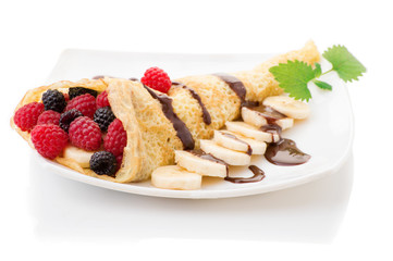 Crepe with Strawberry, Raspberry, Blueberry and Chocolate topping. Pancake