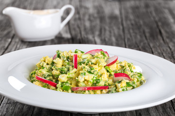 Spring onion, eggs, radish salad, close up