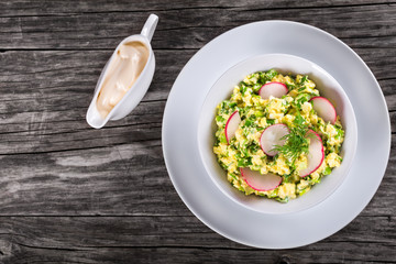 Spring onion, eggs, radish salad, top view