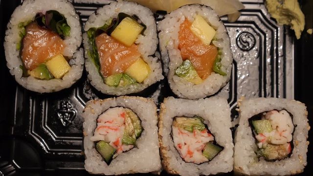 Sushi on tray eaten