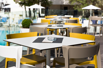 Summer cafe with plastic furniture