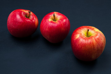 red apple isolated on a black background