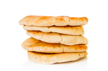 Stack of pita bread on white background