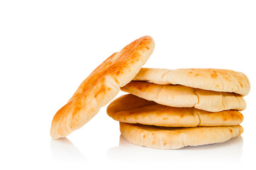 Fresh pita bread on white background