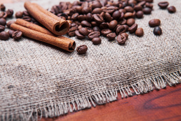 Coffee beans on wood background