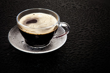 cup coffee on the black background