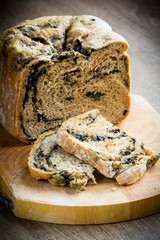 Black homemade bread, with olives, Russian pastries