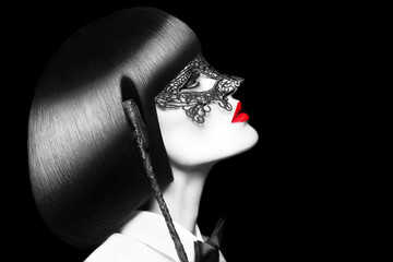 Sexy woman with red lips mask and whip selective coloring bdsm