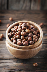 Healthy raw hazelnut on the wooden table