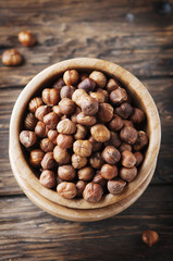 Raw hazelnuts on the vintage table