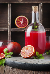 Sweet juice with bloody oranges and mint
