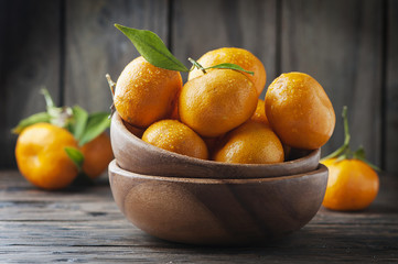 Sweet fresh mandarin on the wooden table