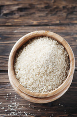 Sweet Brown sugar on the wooden table