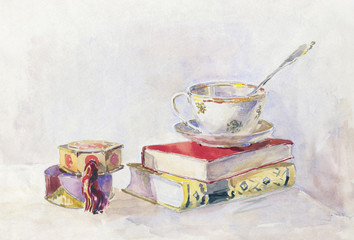 Still life in retro style. Two books tea Cup and powder box. wat
