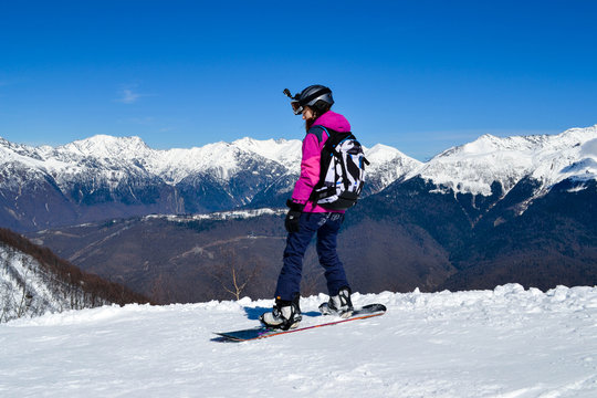 A girl on snowboard