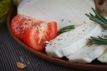 Fresh vegetable salad with tomatoes, cucumbers and onions. Serve