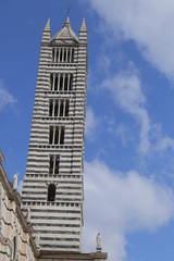 Fototapeta na wymiar Bell Tower of Siena Cathedral - Italy