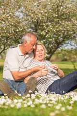 Fototapeta premium Senior couple in love enjoying togetherness outdoor.