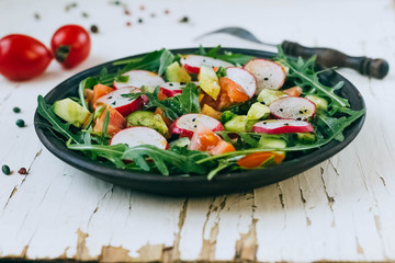 Vegetable salad on wooden background