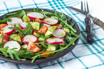 Vegetable salad on wooden background