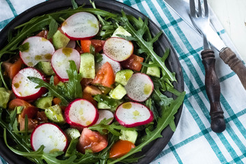 Vegetable salad on wooden background