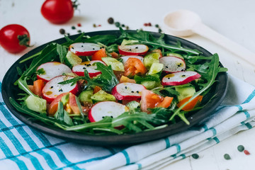 Vegetable salad on wooden background