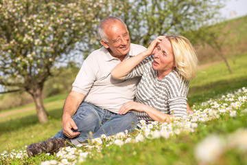 Fototapeta premium Senior couple in love enjoying togetherness outdoor.