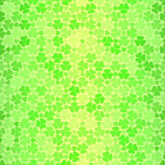 Seamless pattern with green clovers