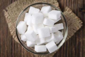 Fototapeta na wymiar Portion of white Sugar in a bowl