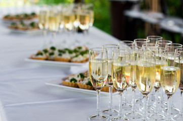 Champagne in glasses with beverages