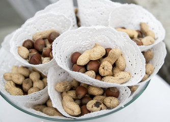 Nuts and peanuts in paper packets