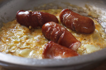 Fried sausages and scrambled eggs 4