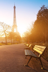 sunny morning in Paris, bench in park near Eiffel tower, France © Song_about_summer