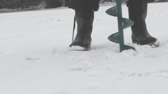 Ice fishing. Revealing depth and presence of fish using sonar 
