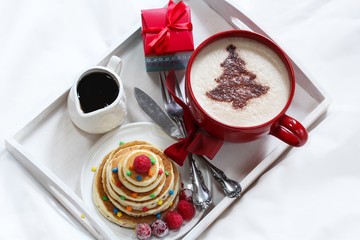 Christmas Breakfast on a tray pancakes and Coffee