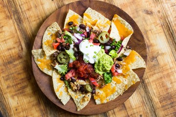 Nacho Cheese Tortilla chips with chili and salsa