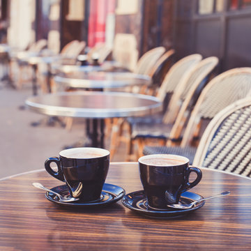 Fototapeta coffee in cozy street cafe in Europe