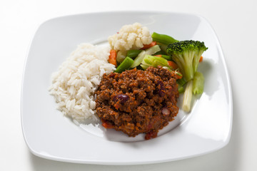 Chili con carne with rice and vegetables