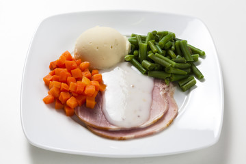 Baked ham with sauce and vegetables