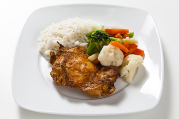 Tandoori chicken with rice and vegetables