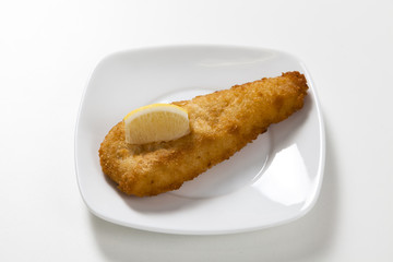 Crumbed fish with lemon