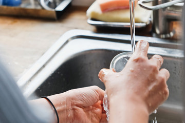 House Work,Close up image of washing dishes.