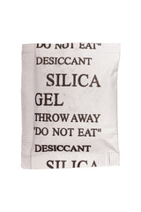 Close up silica gel or desiccant in paper bag on white backgroun