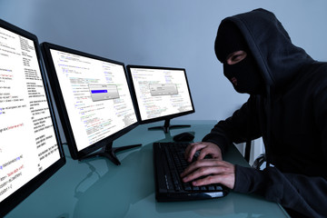 Hacker Stealing Data On Multiple Computers