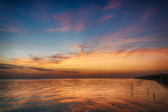 beautiful seascape and twilight sky,  colorful cloudscape background, landscape - Powered by Adobe